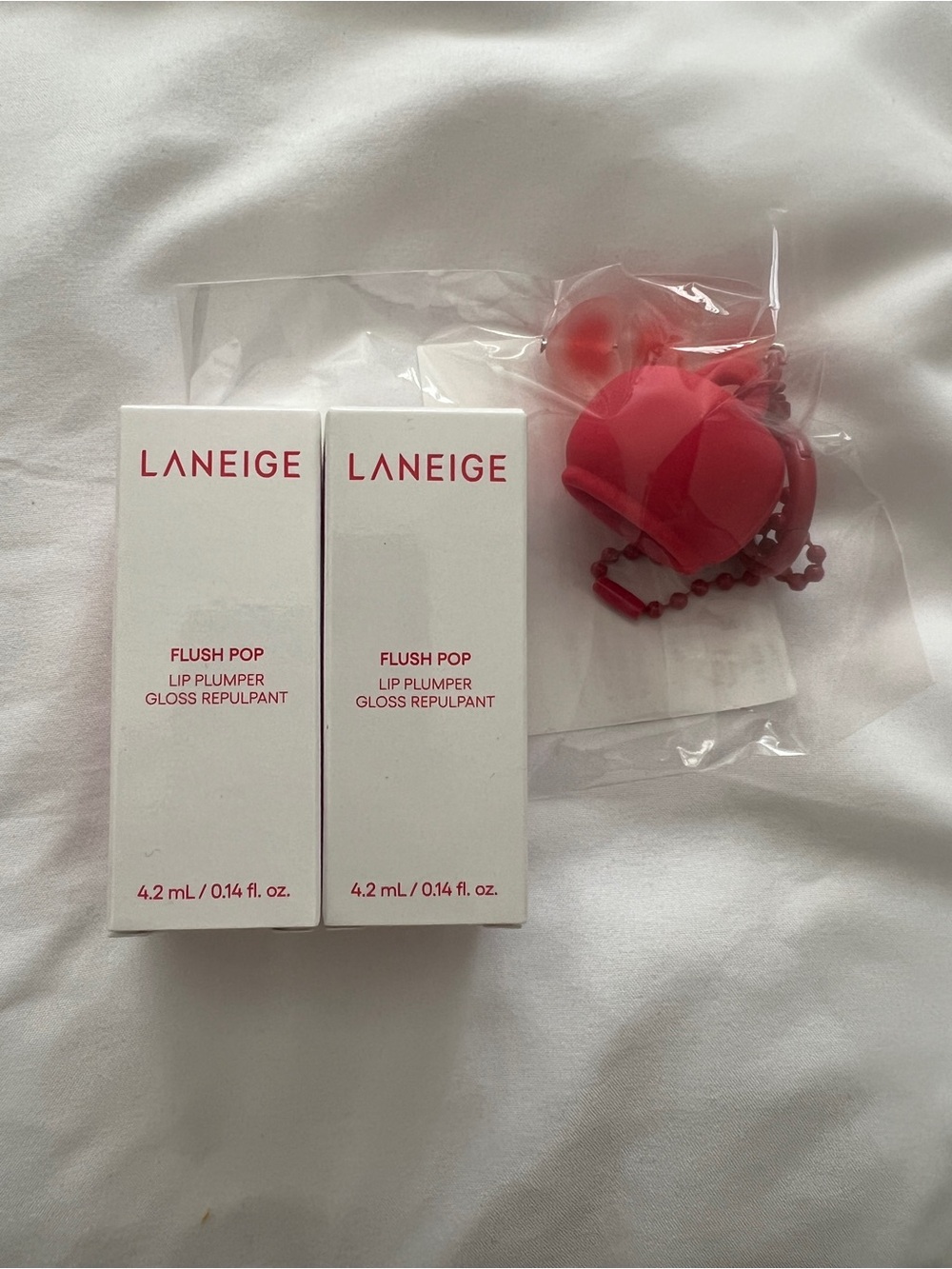 LANEIGE Flush Pop Lip Plumper Gloss set with a keychain
